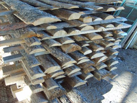 Tapered edge bark-on log siding